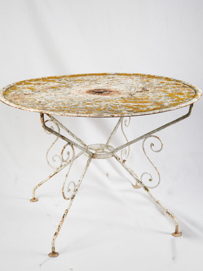 Evocative French wrought iron table  