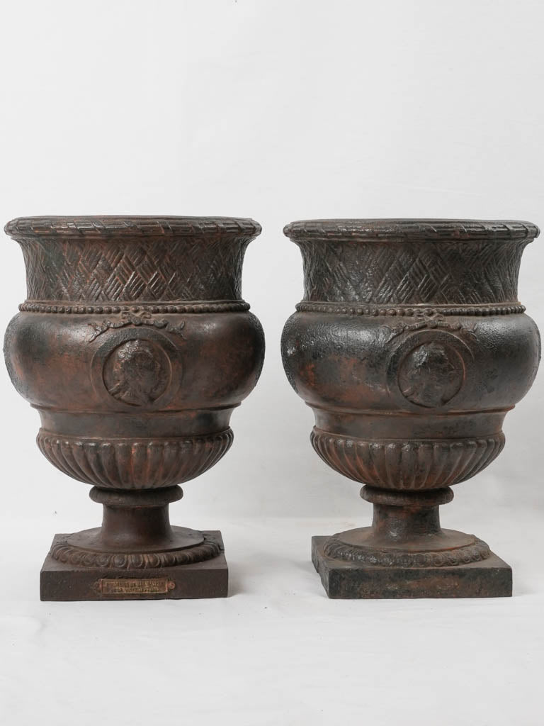 Elegant weathered black cast iron planters