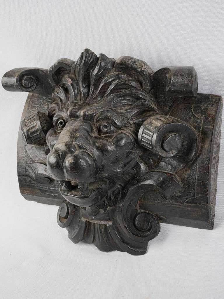 Antique hardwood lion sculpture