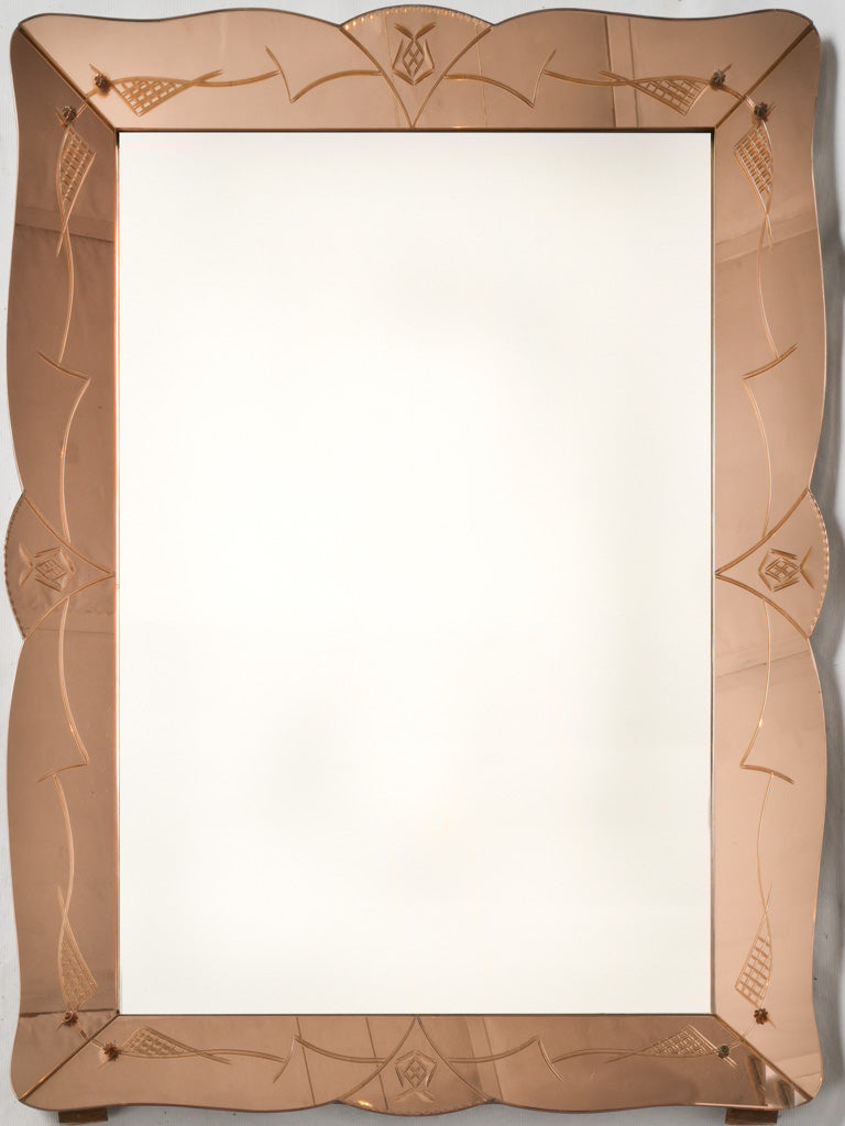 Vintage Venetian pink-tinted framed mirror