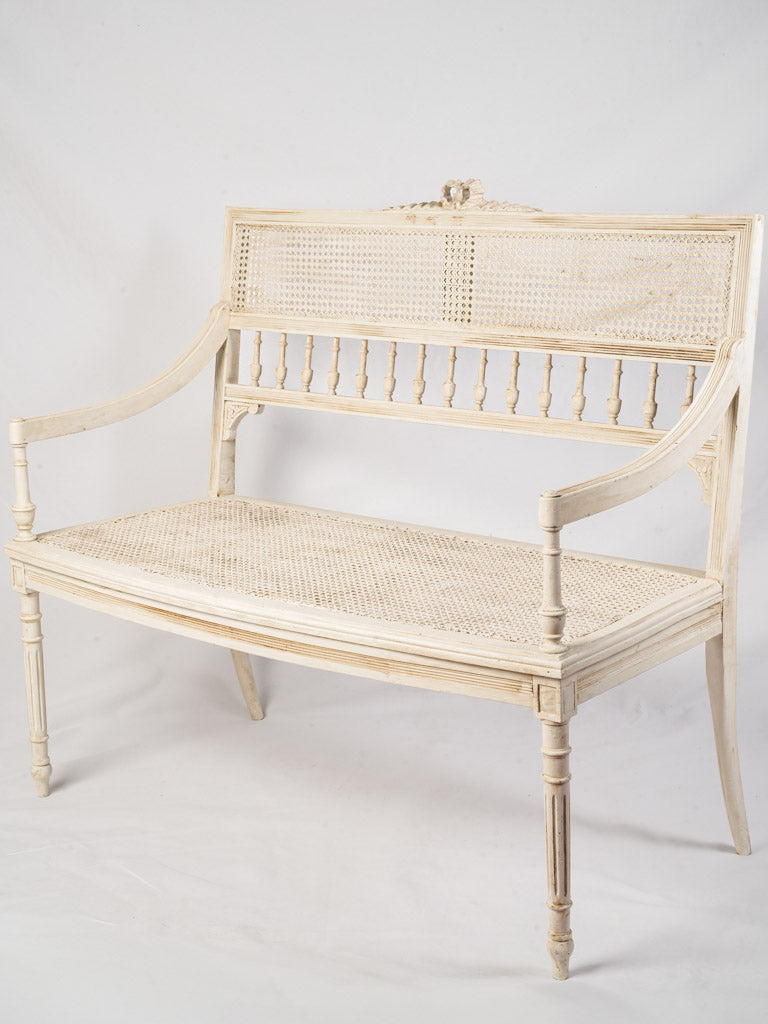 Vintage elegant caned settee