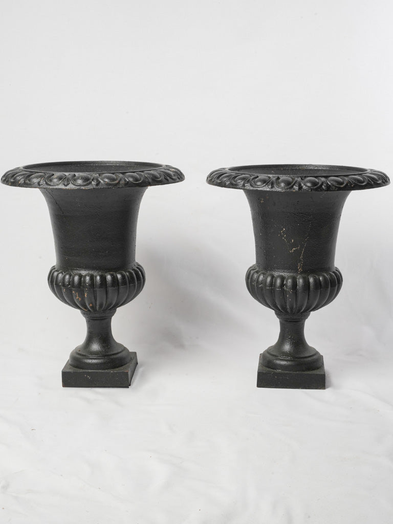 Elegant French cast iron urns  