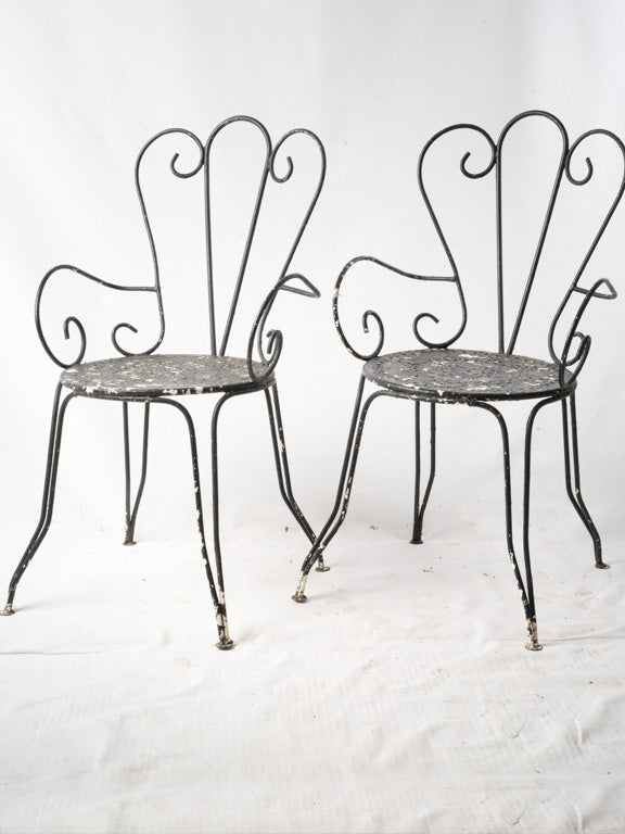 Vintage wrought iron garden armchairs  